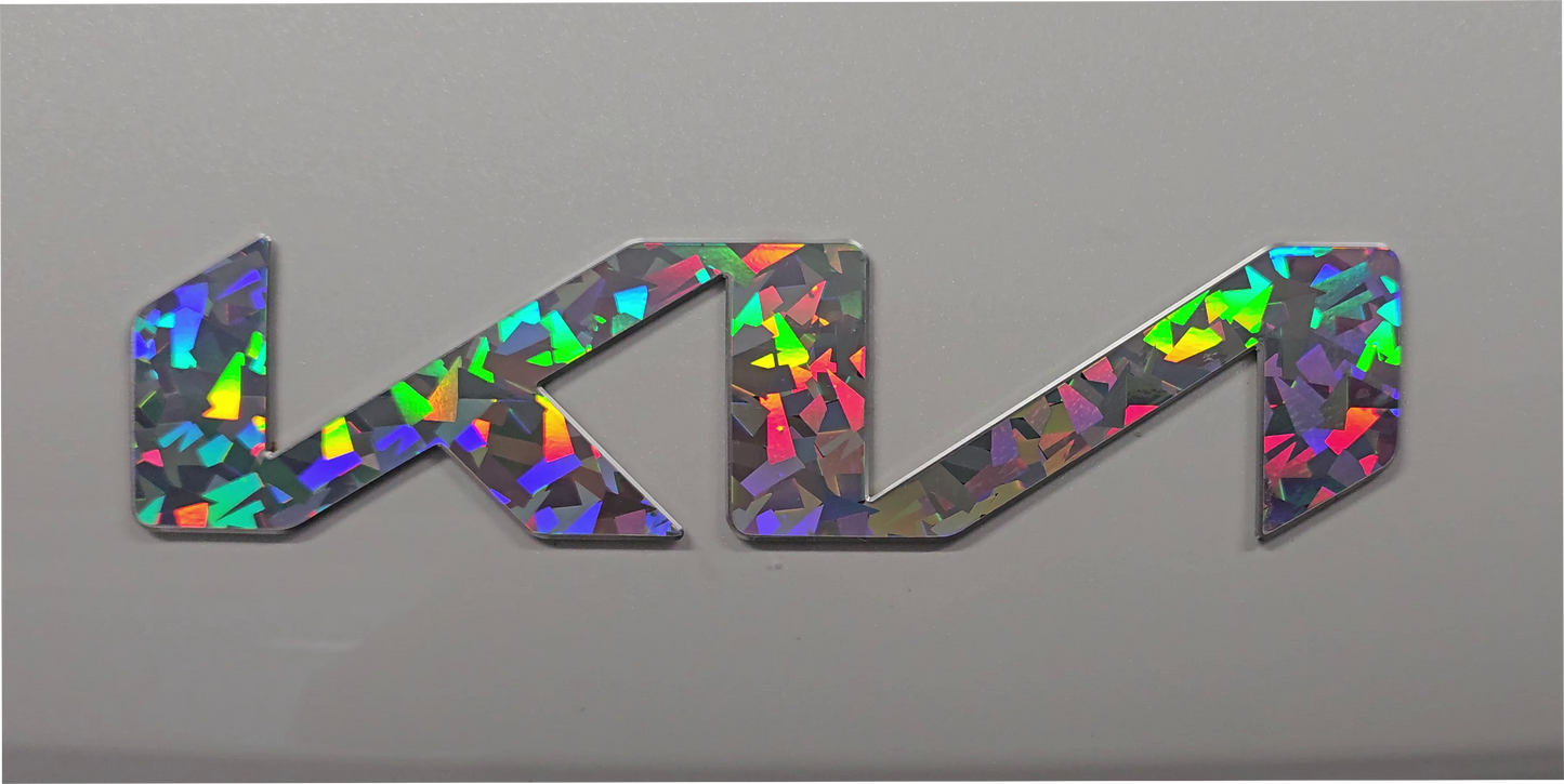 Glass Flower Silver Kia emblem overlay on a gray background