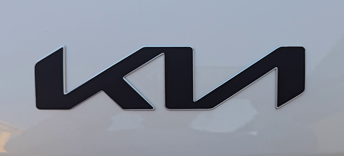 Black Kia logo on a white background
